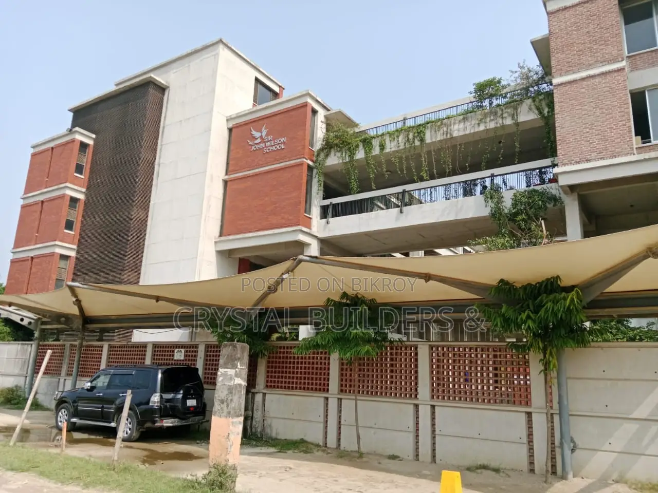 Located in our project next to Glerich School. in Badda