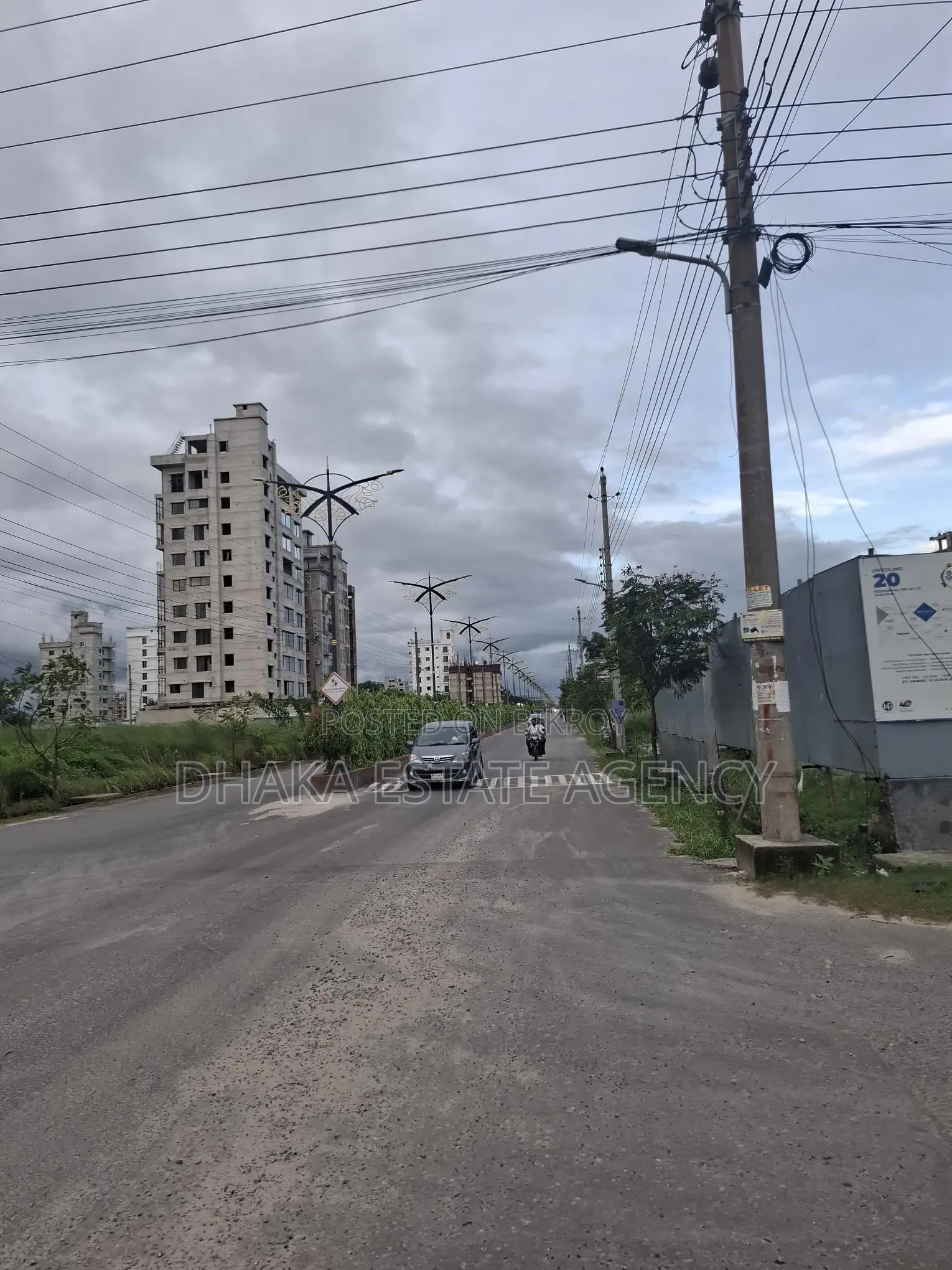 Directly facing the lake and garden, open on south, north, and west sides in Dhaka