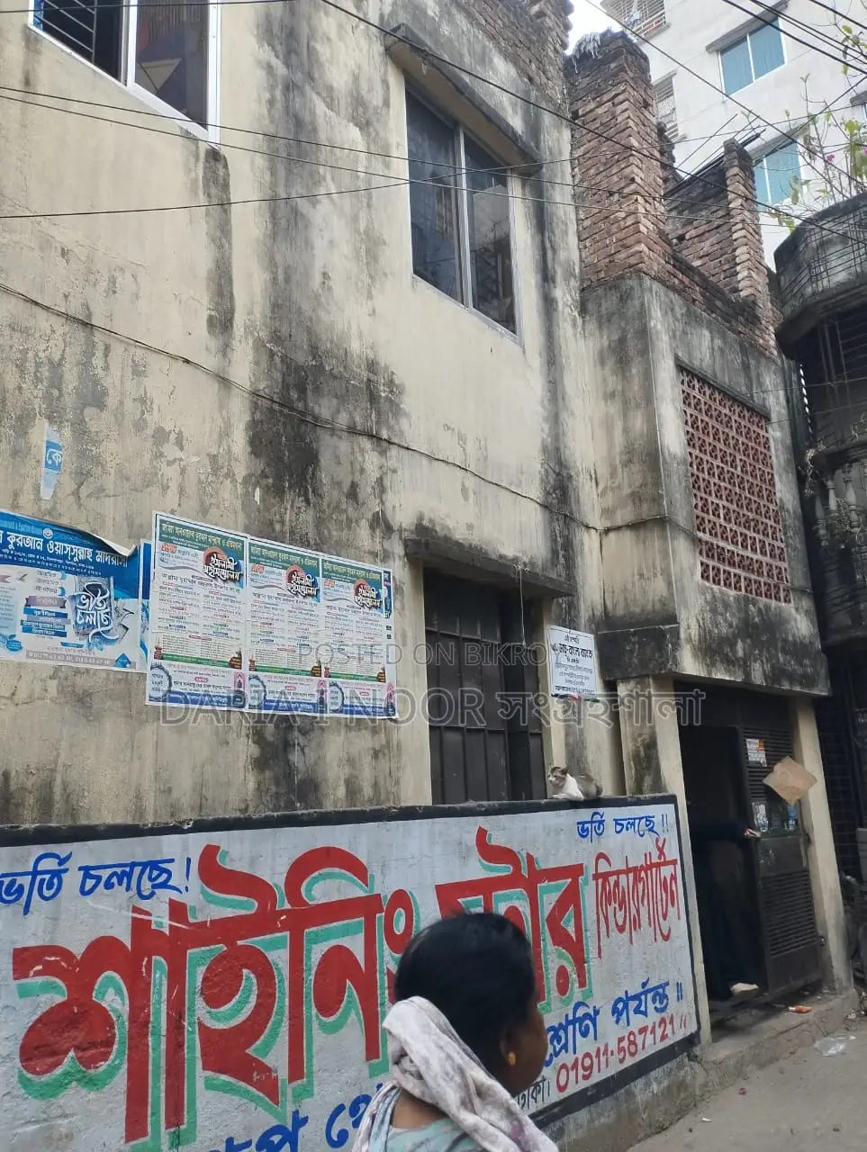 Two-story house with shops for sale in Khilgaon, offering an income opportunity of over 1 lakh in Khilgaon